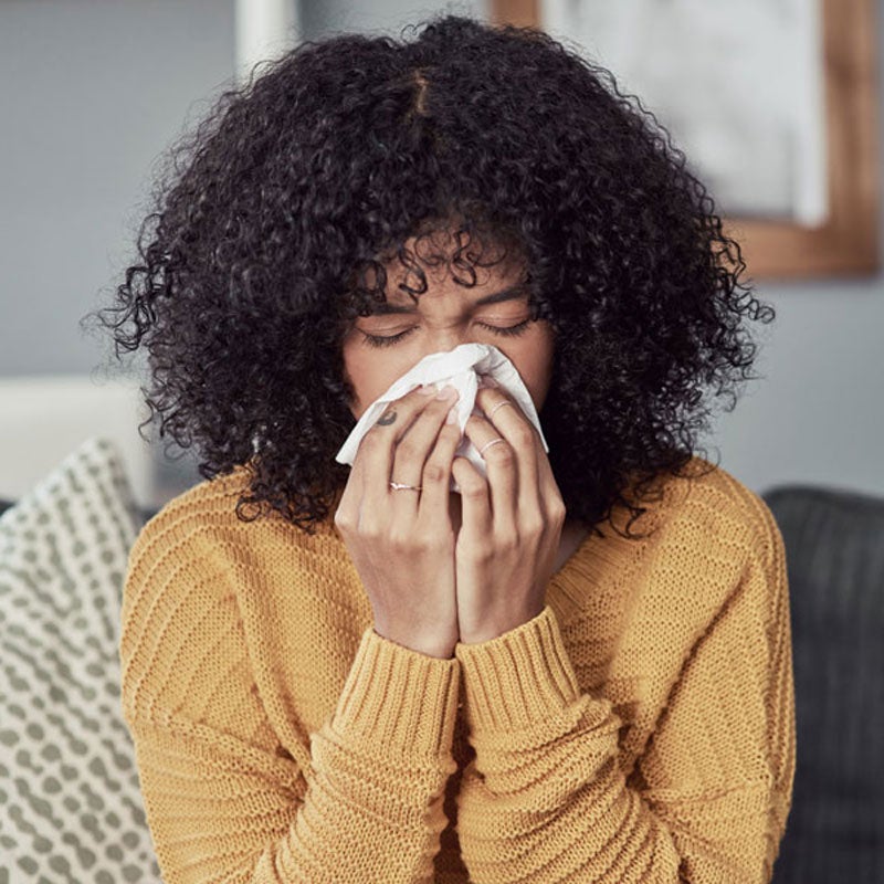 lady blowing nose
