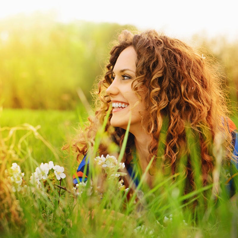lady laying in grass