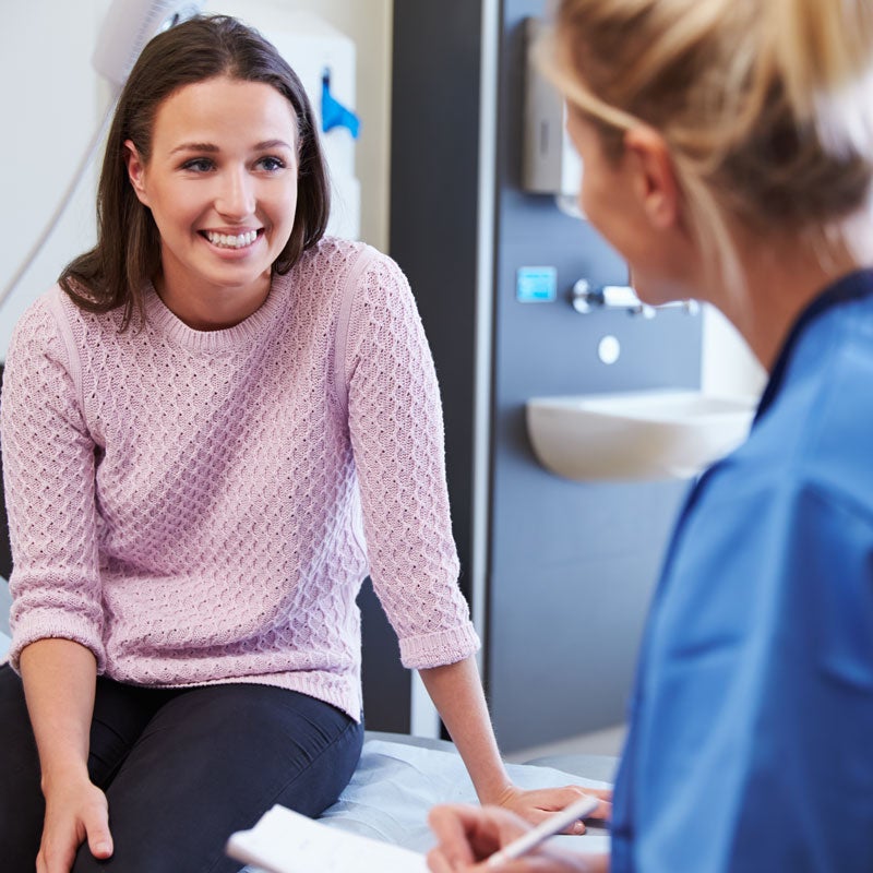 A doctor & her patient interacting about a Septoplasty procedure in Jupiter, FL