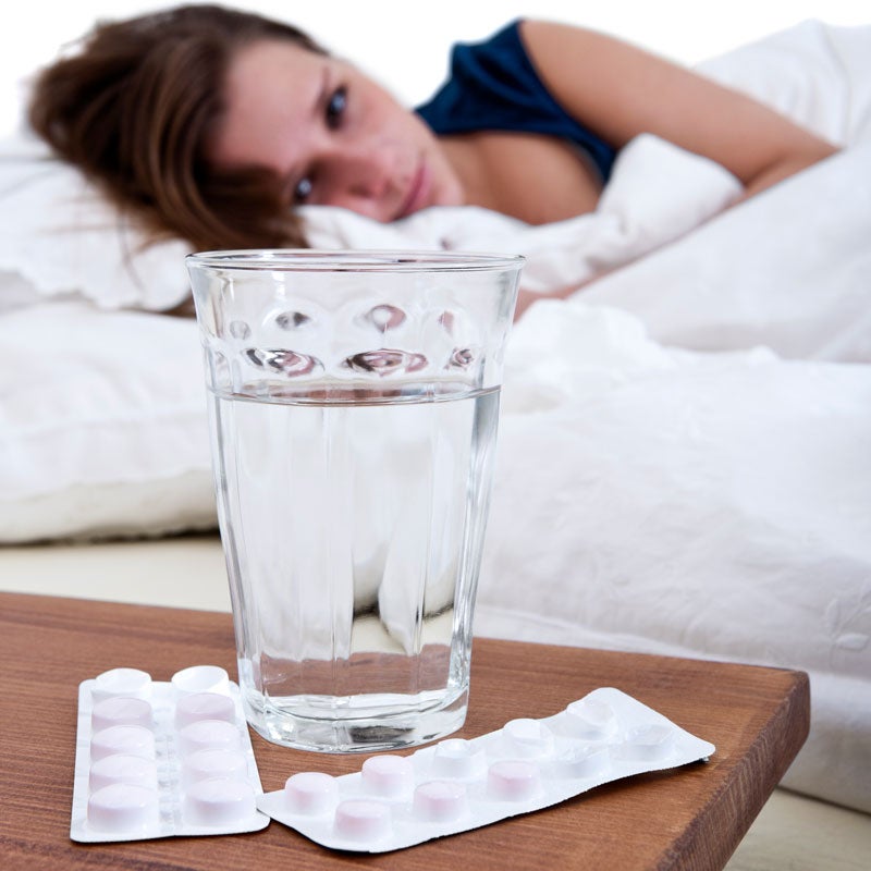 A woman resting on bed after her cycle of medication for sinus issue in Jupiter, FL