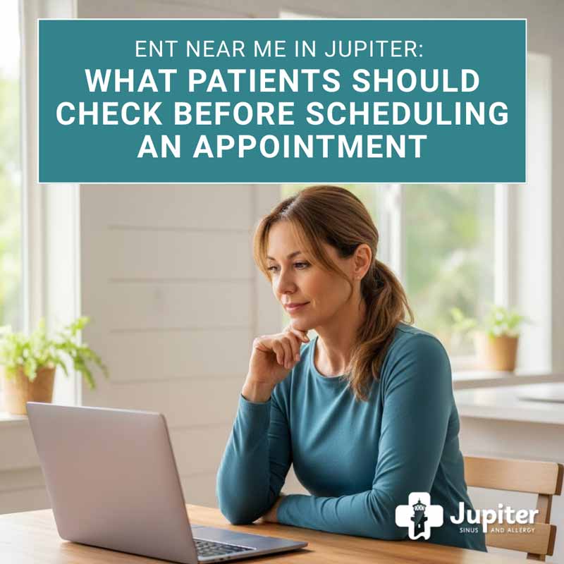 Person sitting at a desk using a laptop