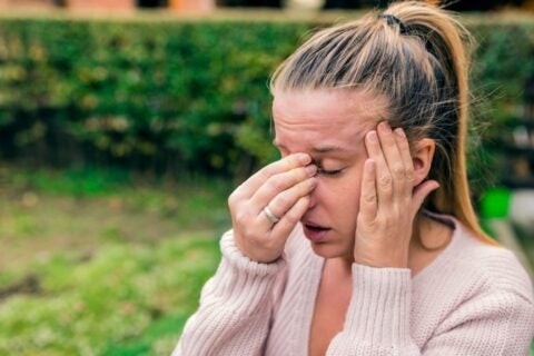 Women having headache and sinus pain